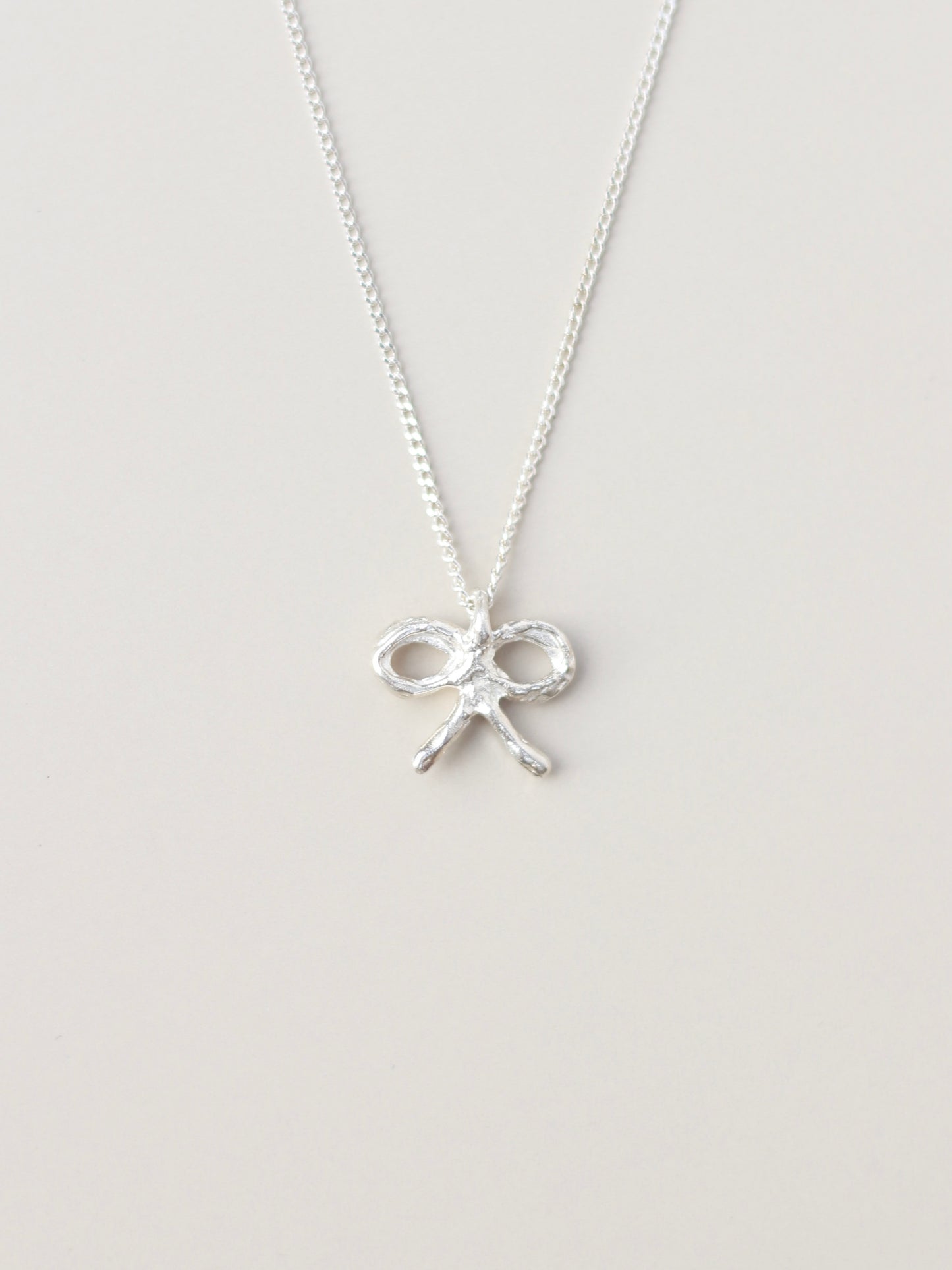 Bow Pendant Necklace Silver